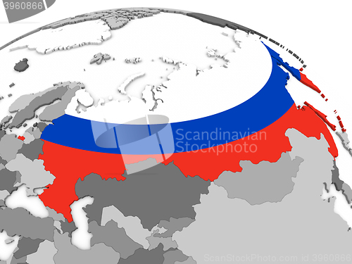 Image of Russia on globe with flag