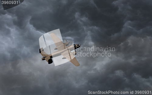 Image of Unmarked bomber flying