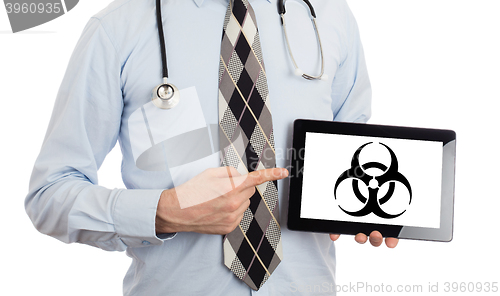 Image of Doctor holding tablet - Warning! Biohazard!