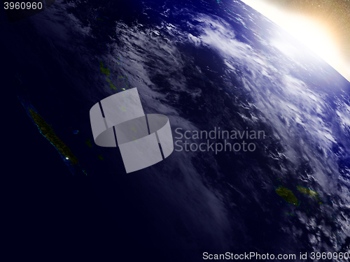 Image of New Caledonia, Fiji and Vanuatu from space during sunrise