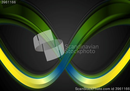 Image of Colorful smooth waves on dark background