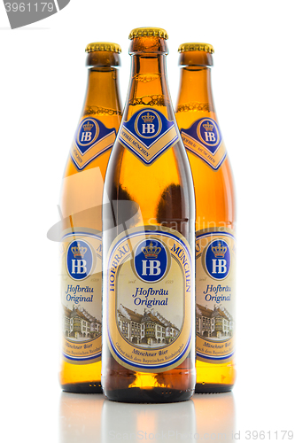 Image of Three bottles cold light lager beer Bavarian Hofbrau Munich brew