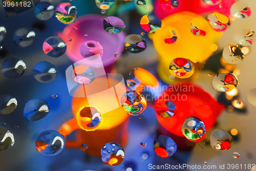 Image of Bright abstract background through drops
