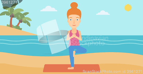Image of Woman practicing yoga.