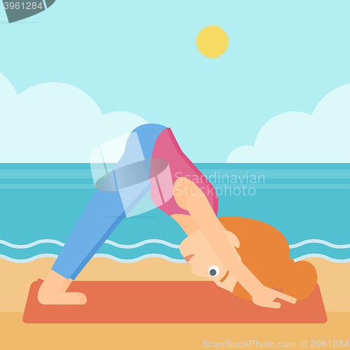 Image of Woman practicing yoga.