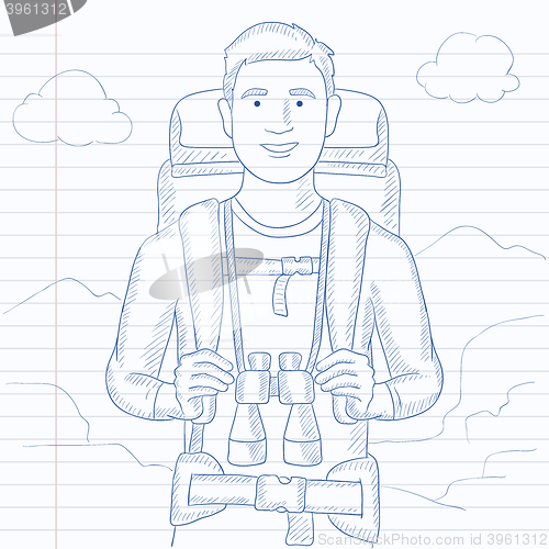 Image of Cheerful backpacker with binoculars.