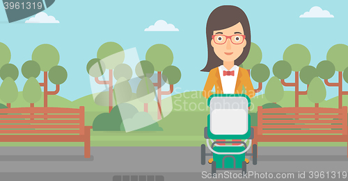 Image of Woman pushing pram.