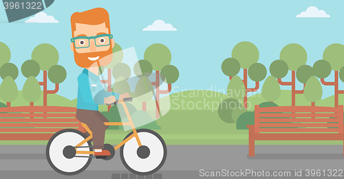 Image of Man riding bicycle.