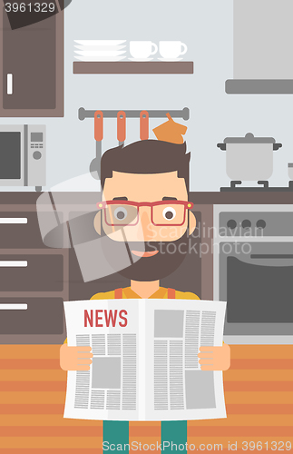 Image of Man reading newspaper.