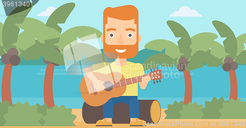 Image of Man playing guitar.