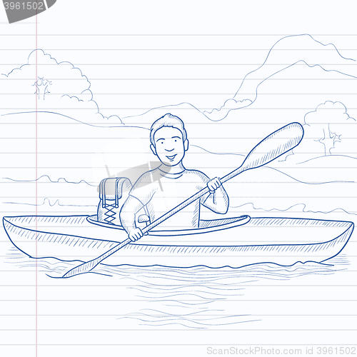 Image of Man canoeing on the river.