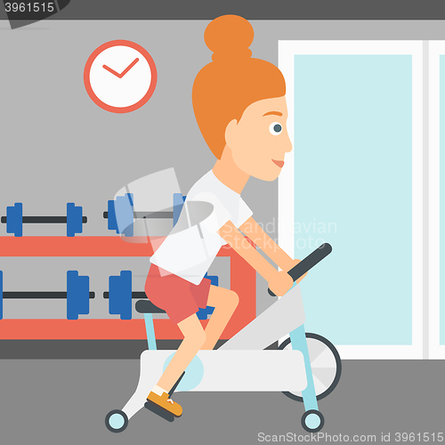 Image of Woman doing cycling exercise.