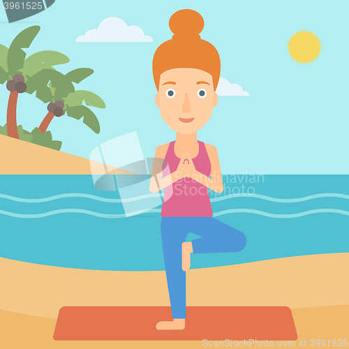Image of Woman practicing yoga.