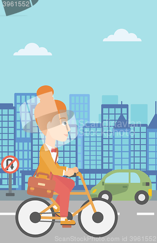 Image of Woman cycling to work.