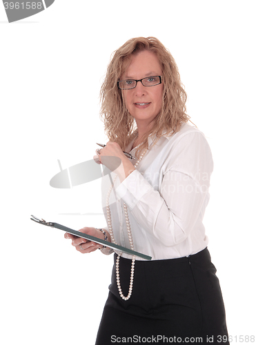 Image of Business woman with glasses and clipboard. 