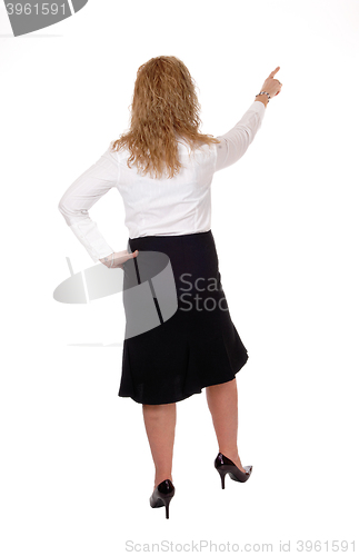 Image of Business woman pointing up.