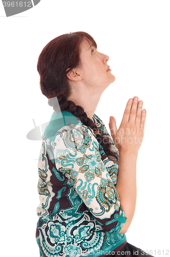 Image of Pretty woman praying.