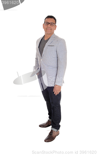 Image of Hispanic man standing full lengths.