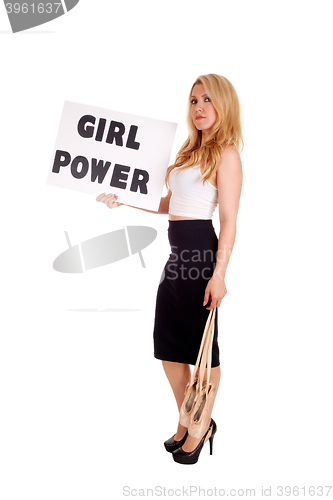 Image of Blond woman holding sign "GIRL POWER".