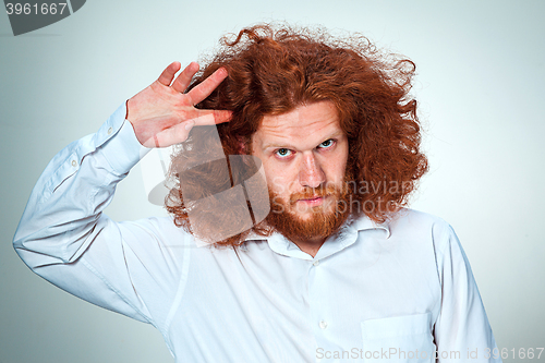 Image of The young man looking at camera