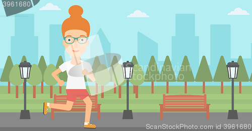Image of Sportive woman jogging.