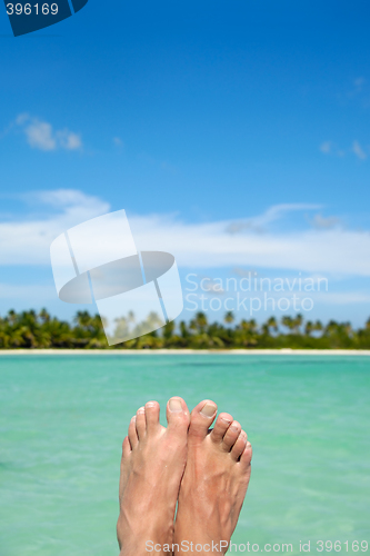 Image of Feet, water and exotic beach