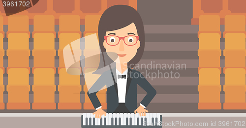 Image of Musician playing piano.