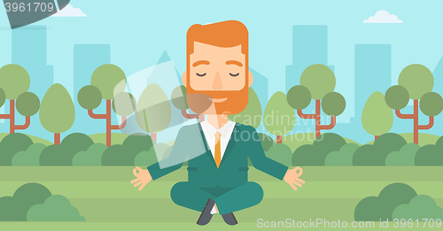 Image of Businessman meditating in lotus pose.