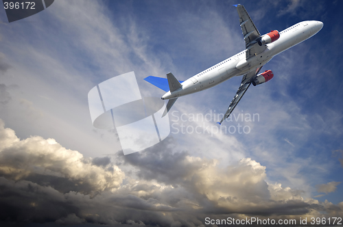 Image of Plane escape from dark thunder clouds
