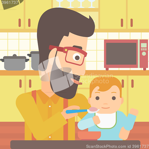 Image of Man feeding baby.