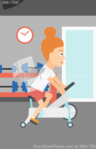 Image of Woman doing cycling exercise.