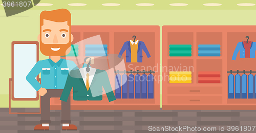 Image of Man holding jacket.