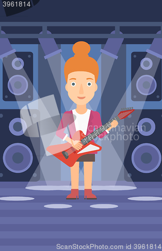 Image of Musician playing electric guitar.