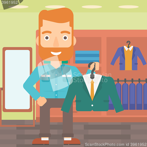 Image of Man holding jacket.