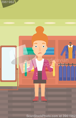 Image of Customer choosing neckties.