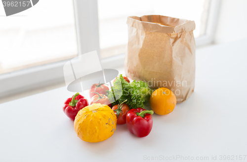 Image of basket of fresh ripe vegetables at kitchen