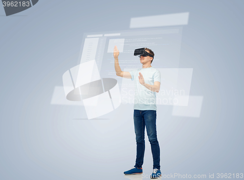 Image of happy man in virtual reality headset or 3d glasses