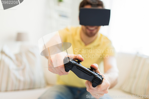 Image of close up of man in virtual reality headset playing