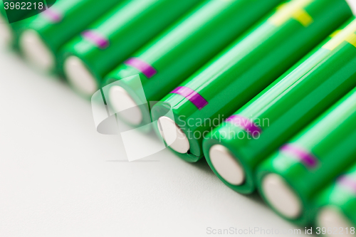 Image of close up of green alkaline batteries