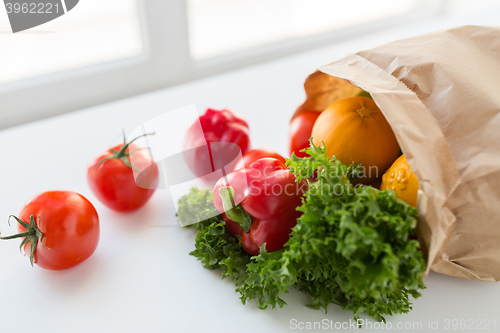 Image of basket of fresh ripe vegetables at kitchen