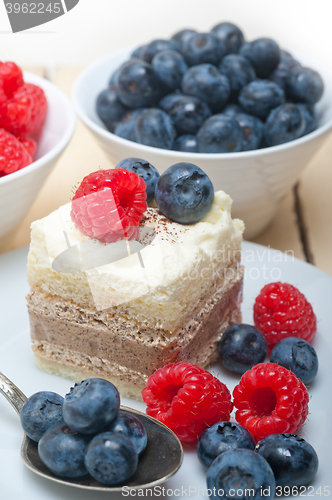 Image of fresh raspberry and blueberry cake