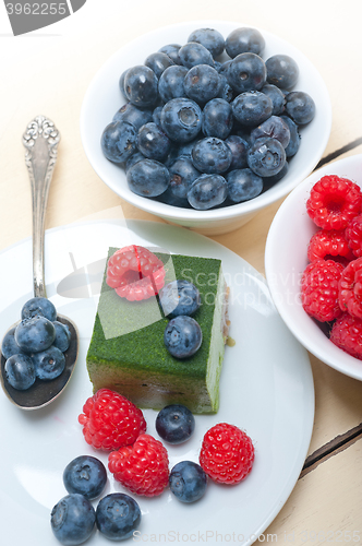 Image of green tea matcha mousse cake with berries