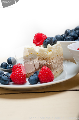 Image of fresh raspberry and blueberry cake