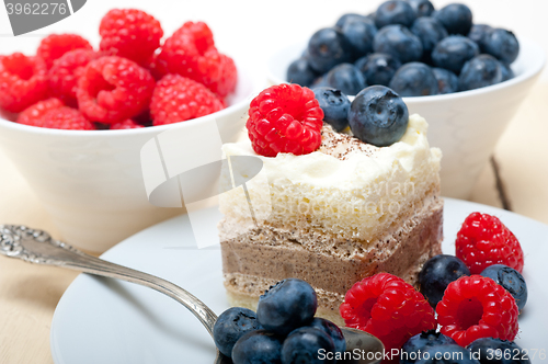 Image of fresh raspberry and blueberry cake