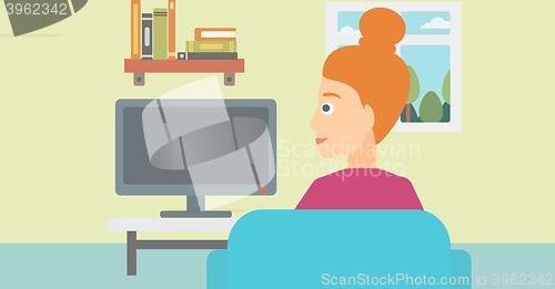 Image of Woman watching TV.