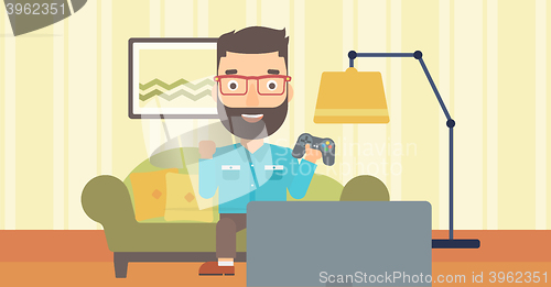 Image of Man playing video game.