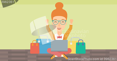 Image of Woman making purchases online.