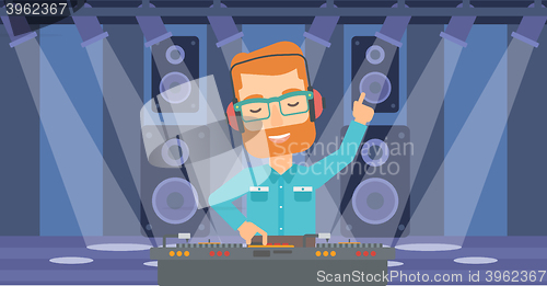 Image of Smiling DJ with console.