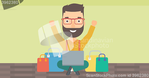 Image of Man making purchases online.