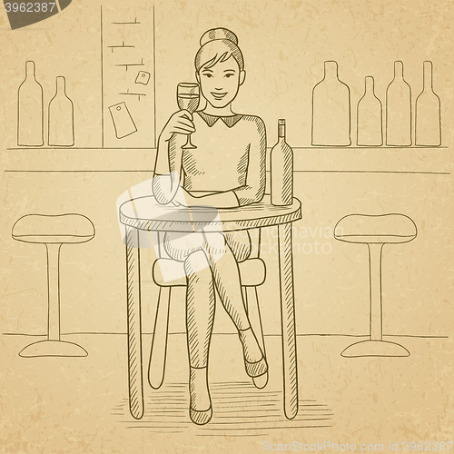 Image of Woman sitting at bar.